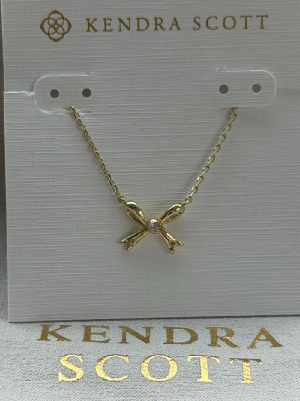 Kendra Scott gold bow necklace